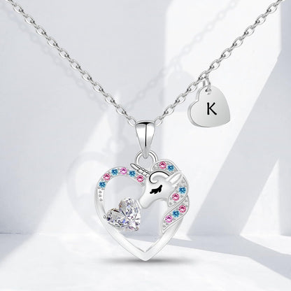 🦄 Unicorn necklace in a heart with the letter K, steel with 14K white coating, zirconium