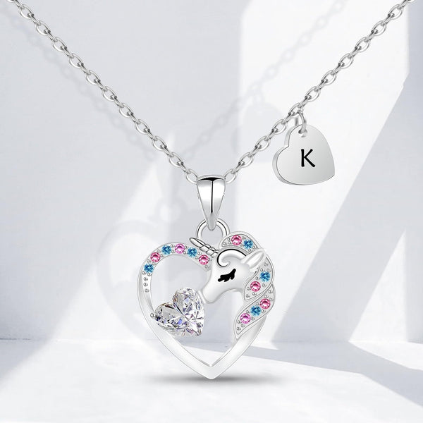 🦄 Ogrlica samorog v srcu s črko K, jeklo z 14K belo prevleko, cirkonij - naklikaj.si
