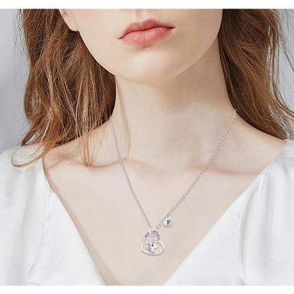 🦄 Unicorn necklace in a heart with the letter K, steel with 14K white coating, zirconium